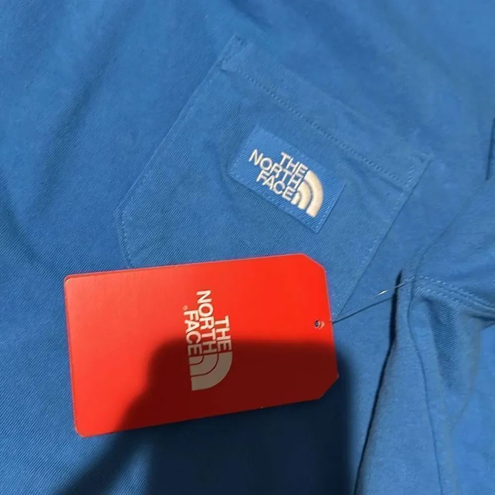 North Face NWT men’s Heritage Patch Pocket in the color super sonic blue size L